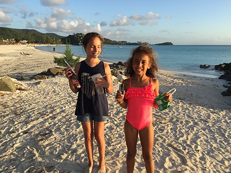 Kids picking up plastic off the beaches